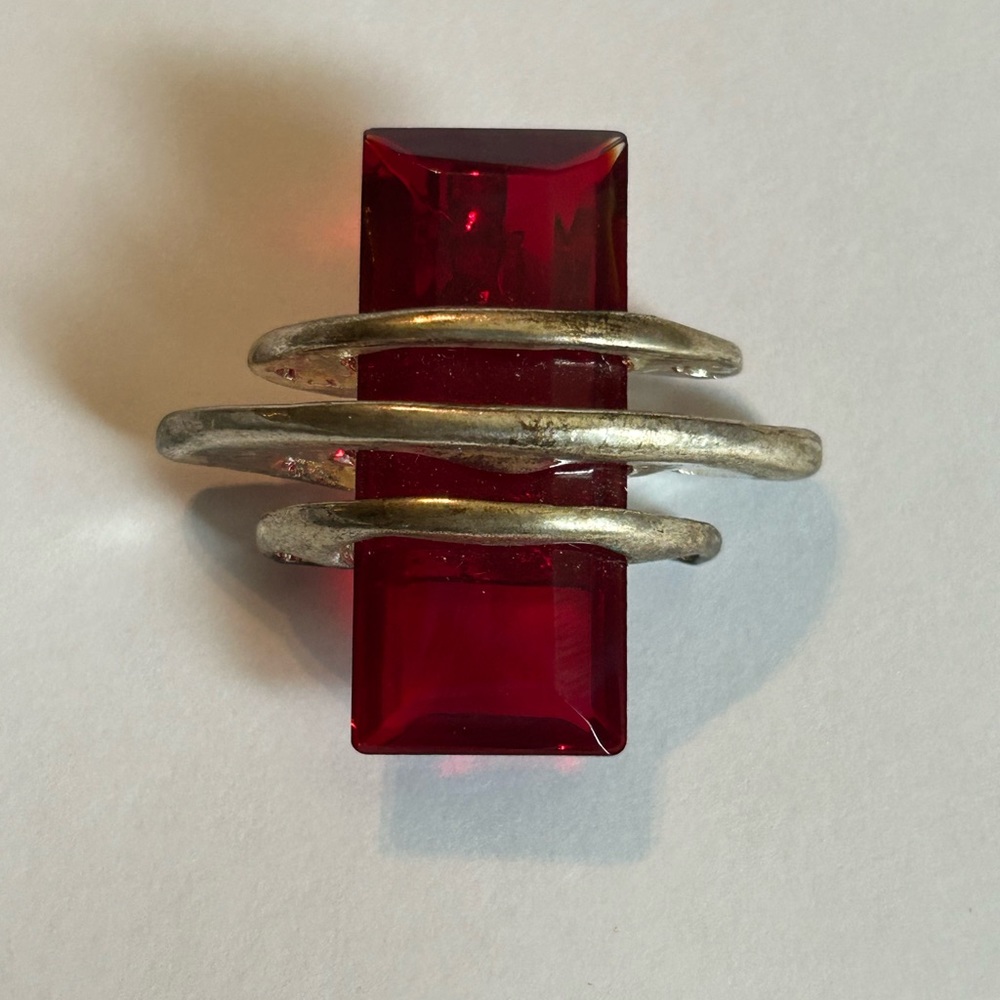 Large 2” Red and silver colored Pendant.